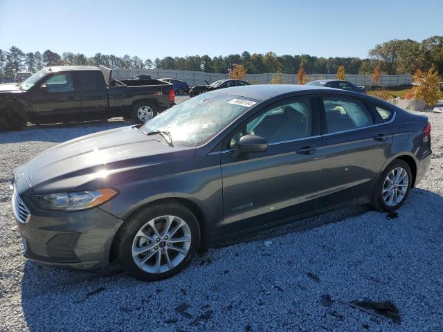 FORD FUSION SE 2019 with VIN 3FA6P0LU9KR152162 - Photo from auction