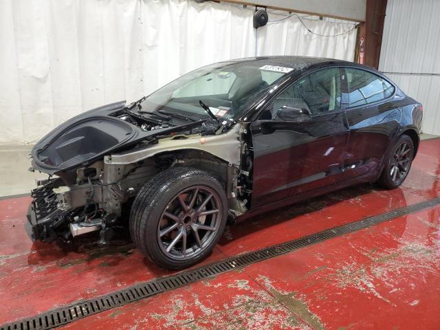 TESLA MODEL 3 2022 with VIN 5YJ3E1EAXNF371164 - Photo from auction