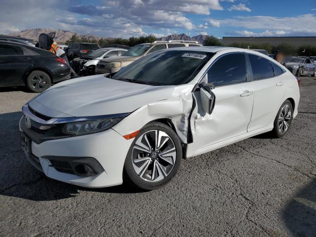 Photo 1 from auction – 2017 HONDA CIVIC EX with VIN 2HGFC1F31HH630367