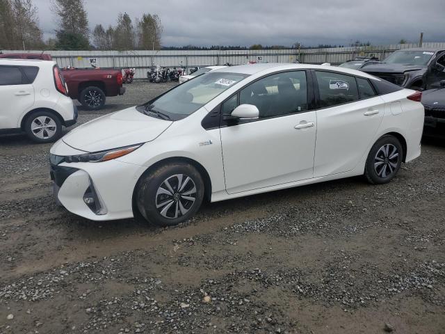 TOYOTA PRIUS PRIM 2018 with VIN JTDKARFP7J3070660 - Photo from auction