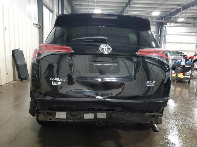 Photo 6 from auction – 2016 TOYOTA RAV4 XLE with VIN 2T3RFREV8GW504462