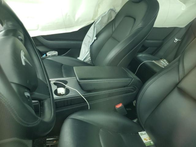 Photo 7 from auction – 2021 TESLA MODEL 3 with VIN 5YJ3E1EA4MF092274