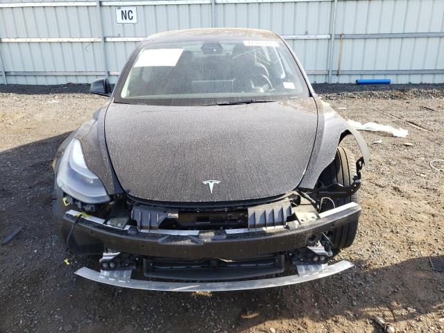 Photo 5 from auction – 2022 TESLA MODEL 3 with VIN 5YJ3E1EBXNF257139