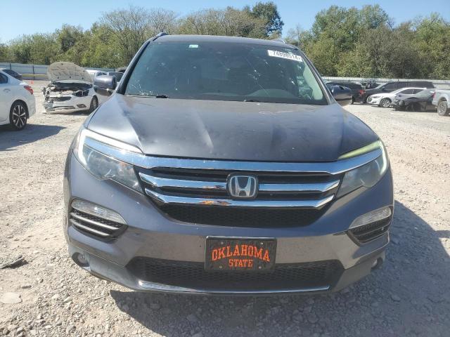 Photo 5 from auction – 2016 HONDA PILOT ELIT with VIN 5FNYF6H09GB116916