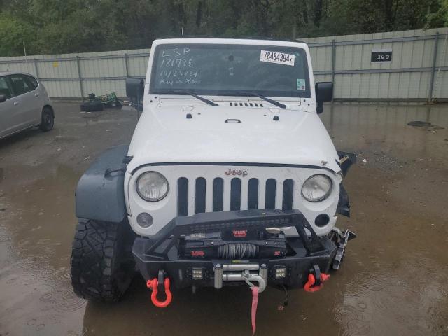 Photo 5 from auction – 2014 JEEP WRANGLER U with VIN 1C4BJWDG1EL223816