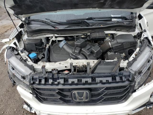 Photo 12 from auction – 2021 HONDA RIDGELINE with VIN 5FPYK3F14MB001150