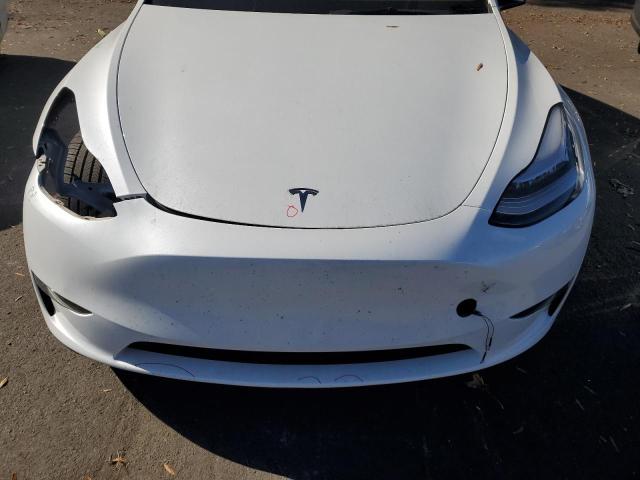 Photo 11 from auction – 2023 TESLA MODEL Y with VIN 7SAYGDEEXPA052211