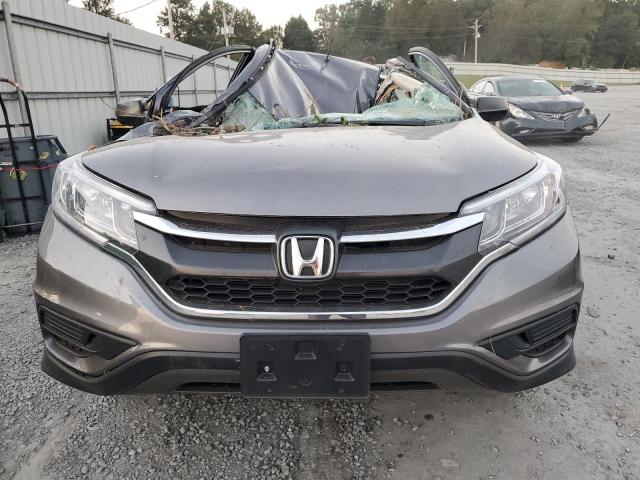 Photo 5 from auction – 2016 HONDA CR-V SE with VIN 5J6RM4H44GL059999