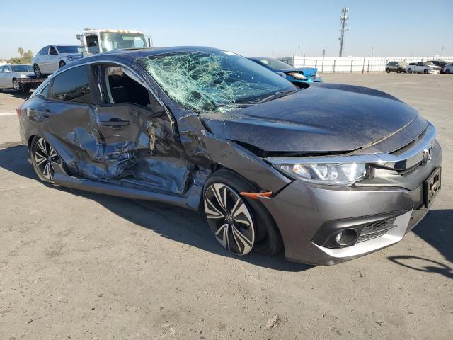 Photo 4 from auction – 2018 HONDA CIVIC EX with VIN JHMFC1F32JX017611