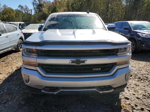 Photo 5 from auction – 2018 CHEVROLET SILVERADO with VIN 3GCUKREC6JG508117