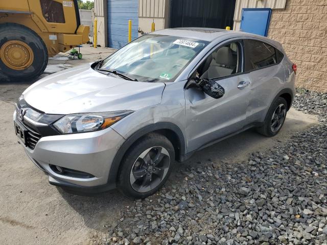 HONDA HR-V EX 2018 with VIN 3CZRU6H59JM718461 - Photo from auction