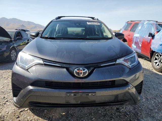 Photo 5 from auction – 2018 TOYOTA RAV4 LE with VIN JTMBFREV4JJ257402