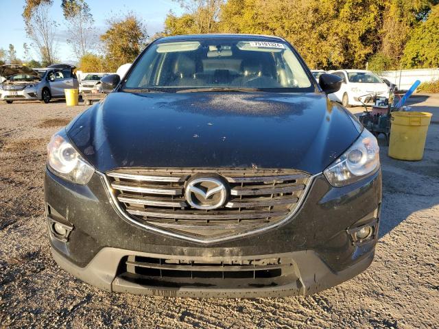 Photo 5 from auction – 2016 MAZDA CX-5 TOURI with VIN JM3KE4CY3G0909175