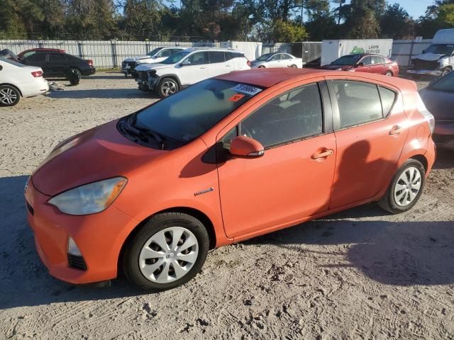 TOYOTA PRIUS C 2013 with VIN JTDKDTB34D1035596 - Photo from auction