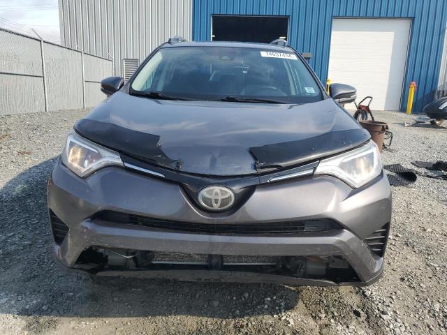 Photo 5 from auction – 2018 TOYOTA RAV4 LE with VIN 2T3BFREV5JW696030