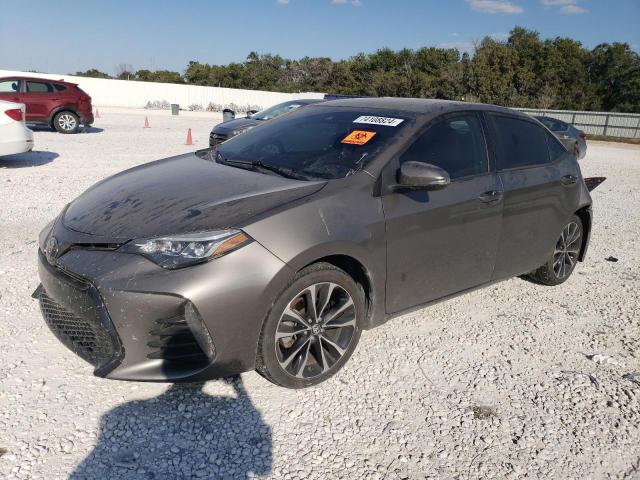 TOYOTA COROLLA L 2019 with VIN 5YFBURHE1KP936946 - Photo from auction