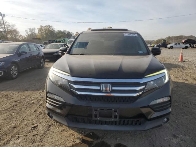 Photo 5 from auction – 2016 HONDA PILOT EXL with VIN 5FNYF6H68GB097263