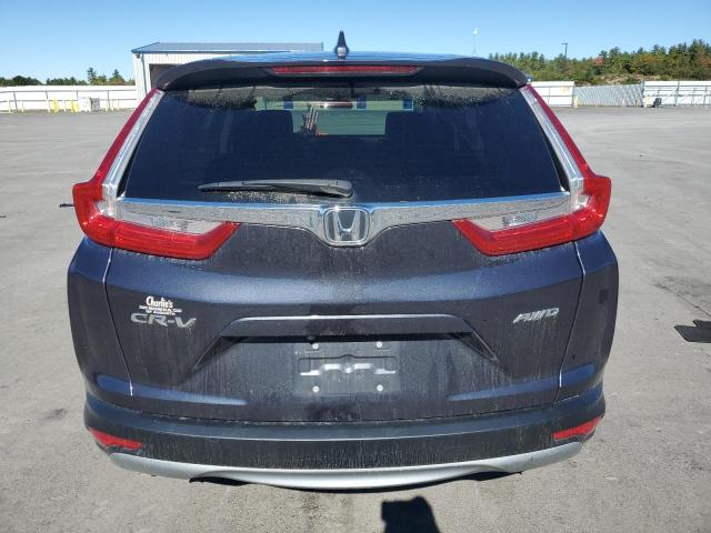 Photo 6 from auction – 2018 HONDA CR-V EX with VIN 7FARW2H51JE012134