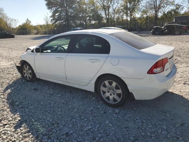 Photo 2 from auction – 2011 HONDA CIVIC LX with VIN 19XFA1F52BE029879