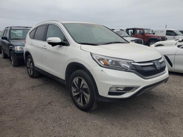 Photo 4 from auction – 2015 HONDA CR-V TOURI with VIN 5J6RM3H97FL012034