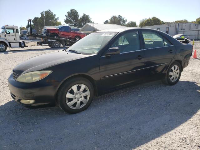 TOYOTA CAMRY LE 2004 with VIN 4T1BE32KX4U275993 - Photo from auction