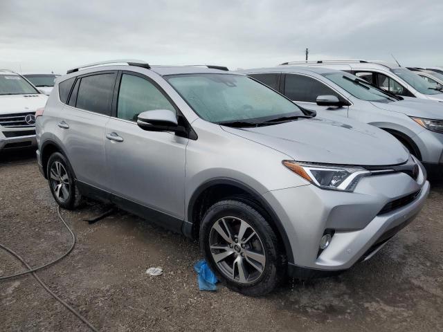 Photo 4 from auction – 2016 TOYOTA RAV4 XLE with VIN 2T3WFREVXGW297415