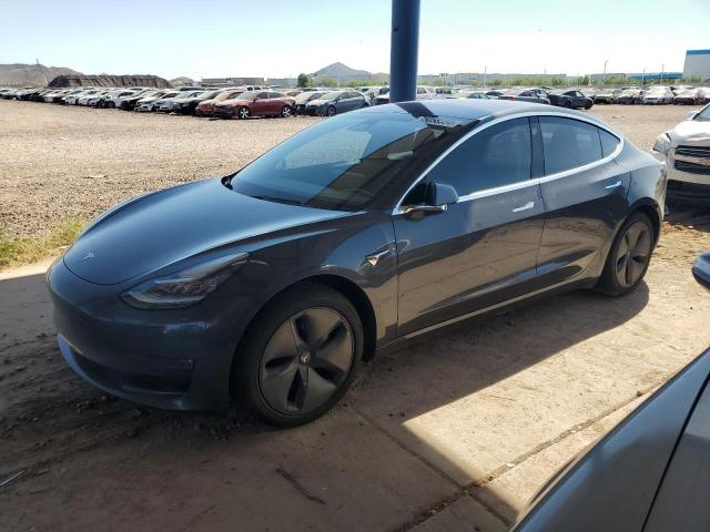 TESLA MODEL 3 2018 with VIN 5YJ3E1EAXJF044967 - Photo from auction