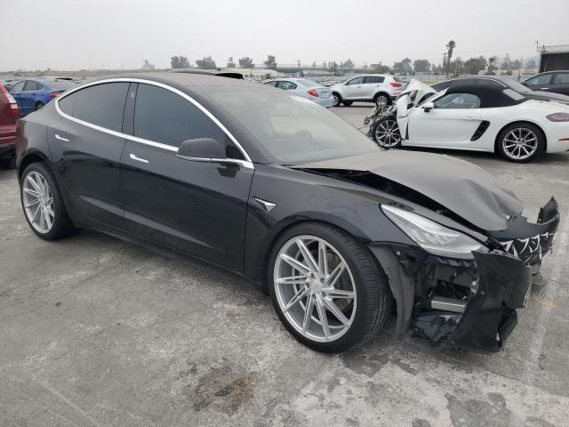 Photo 4 from auction – 2018 TESLA MODEL 3 with VIN 5YJ3E1EB0JF084516