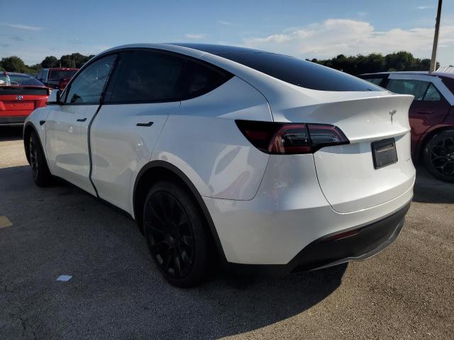 Photo 2 from auction – 2023 TESLA MODEL Y with VIN 7SAYGDEE1PA060777
