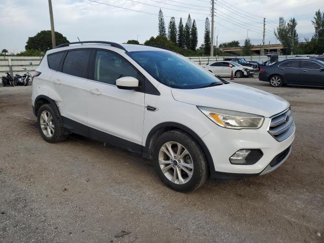 Photo 4 from auction – 2018 FORD ESCAPE SE with VIN 1FMCU0GD9JUB36577