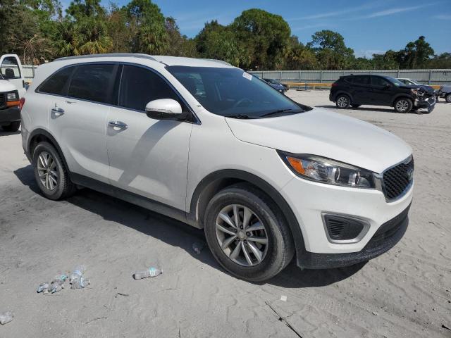 Photo 4 from auction – 2016 KIA SORENTO LX with VIN 5XYPG4A59GG110285
