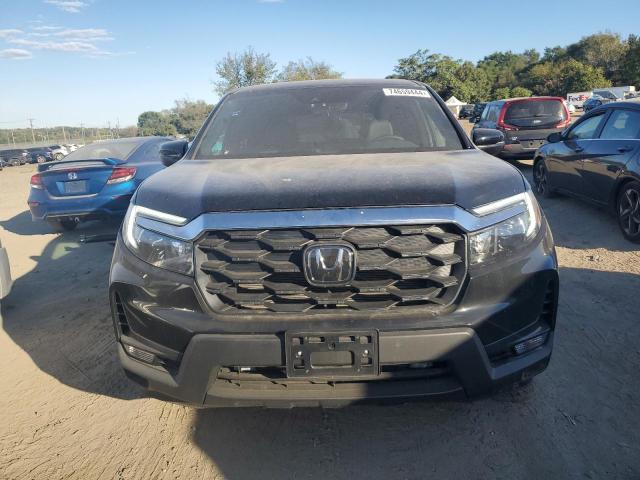 Photo 5 from auction – 2023 HONDA PASSPORT E with VIN 5FNYF8H57PB036134