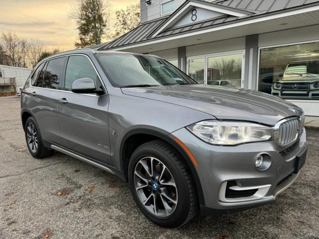 BMW X5 XDR40E 2018 with VIN 5UXKT0C5XJ0W01018 - Photo from auction