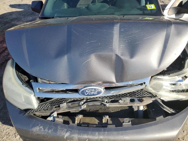 Photo 11 from auction – 2011 FORD FOCUS SE with VIN 1FAHP3FN2BW100142