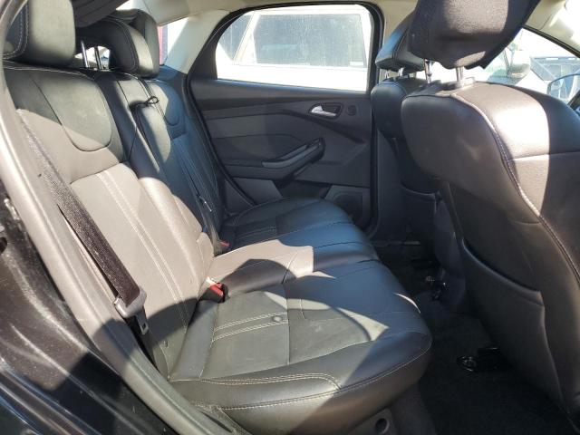 Photo 10 from auction – 2014 FORD FOCUS TITA with VIN 1FADP3J28EL227947
