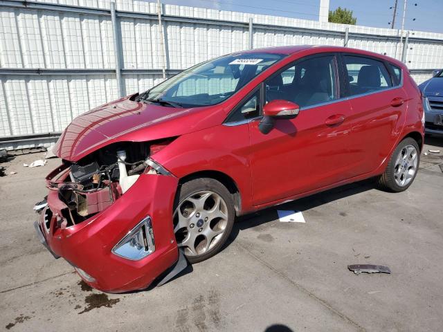 FORD FIESTA SES 2011 with VIN 3FADP4FJ8BM105783 - Photo from auction