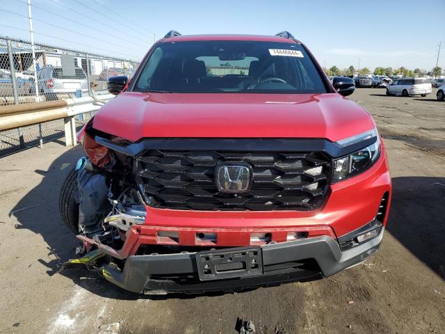Photo 5 from auction – 2023 HONDA PASSPORT E with VIN 5FNYF8H04PB031669