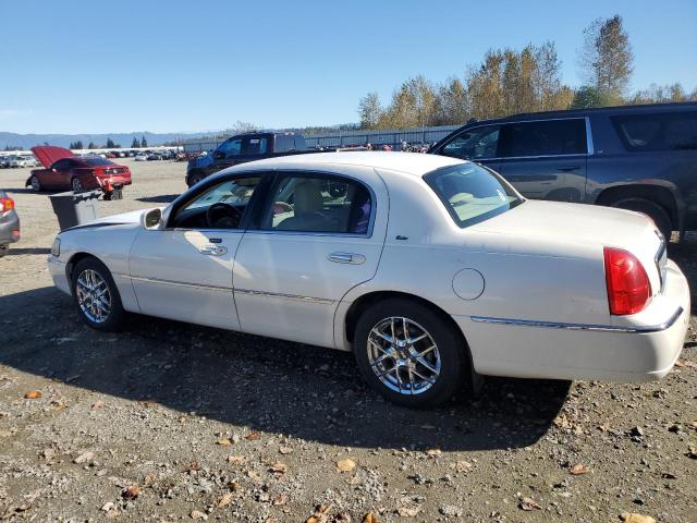 Photo 2 from auction – 2003 LINCOLN TOWN CAR C with VIN 1LNHM83W03Y629412