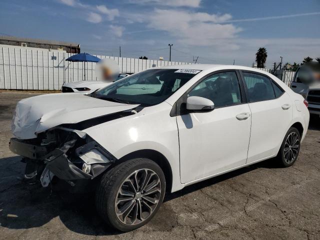 TOYOTA COROLLA L 2015 with VIN 5YFBURHE1FP311825 - Photo from auction