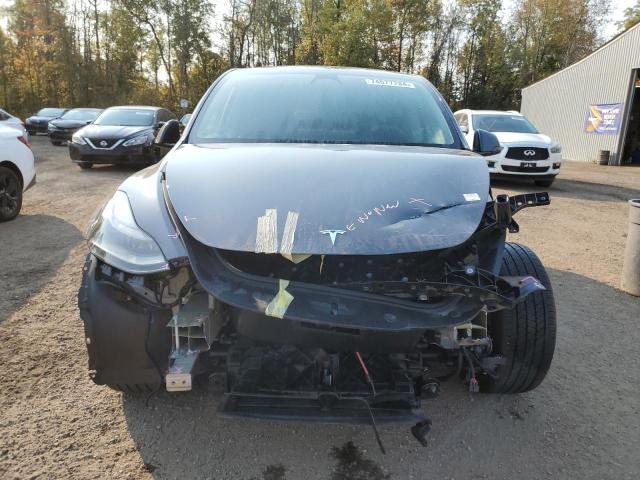 Photo 5 from auction – 2023 TESLA MODEL Y with VIN 7SAYGDEEXPF774071