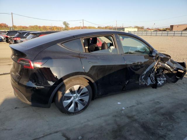 Photo 3 from auction – 2023 TESLA MODEL Y with VIN 7SAYGDEE5PA189671