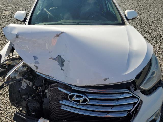 Photo 12 from auction – 2016 HYUNDAI SANTA FE S with VIN KM8SR4HF4GU139917