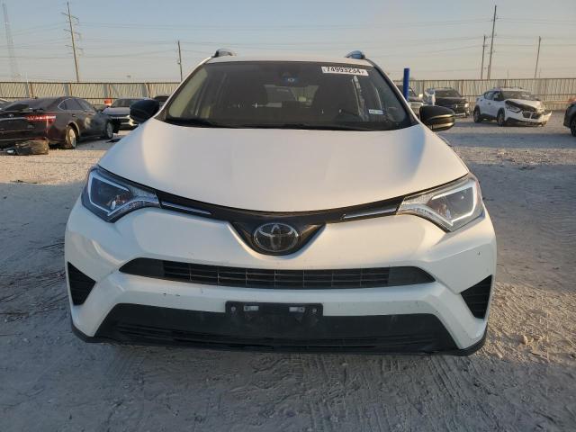 Photo 5 from auction – 2018 TOYOTA RAV4 LE with VIN JTMZFREV3JJ171433