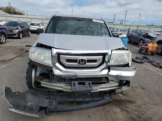 Photo 5 from auction – 2011 HONDA PILOT LX with VIN 5FNYF4H21BB068438