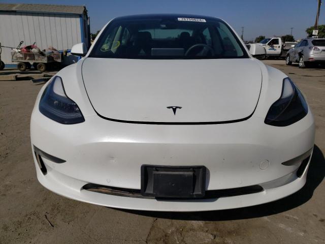 Photo 5 from auction – 2021 TESLA MODEL 3 with VIN 5YJ3E1EAXMF028143