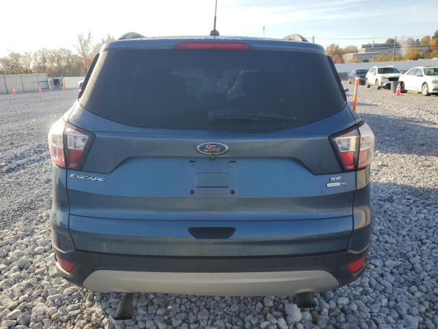 Photo 6 from auction – 2018 FORD ESCAPE SE with VIN 1FMCU9GD7JUC00880