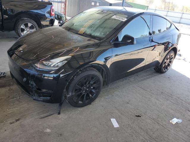 TESLA MODEL Y 2023 with VIN 7SAYGDEE3PA110482 - Photo from auction