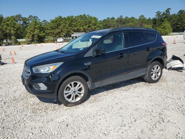 FORD ESCAPE SE 2018 with VIN 1FMCU0GD9JUA04547 - Photo from auction