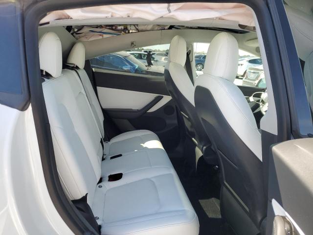 Photo 11 from auction – 2021 TESLA MODEL Y with VIN 5YJYGDED6MF105246
