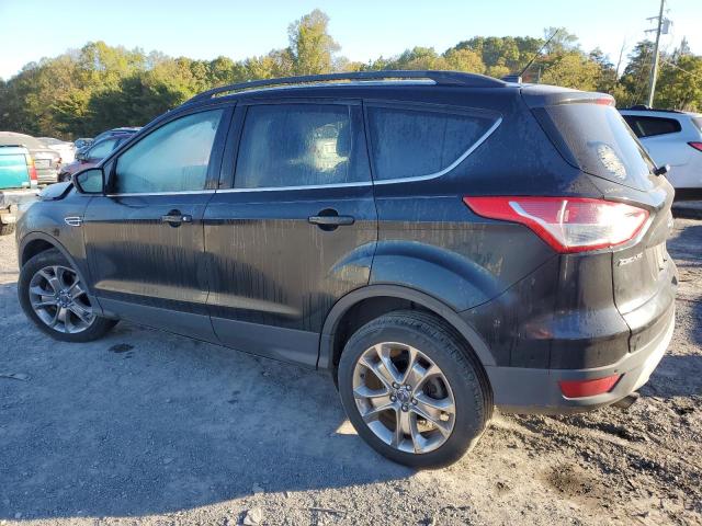 Photo 2 from auction – 2014 FORD ESCAPE SE with VIN 1FMCU9G99EUD62799